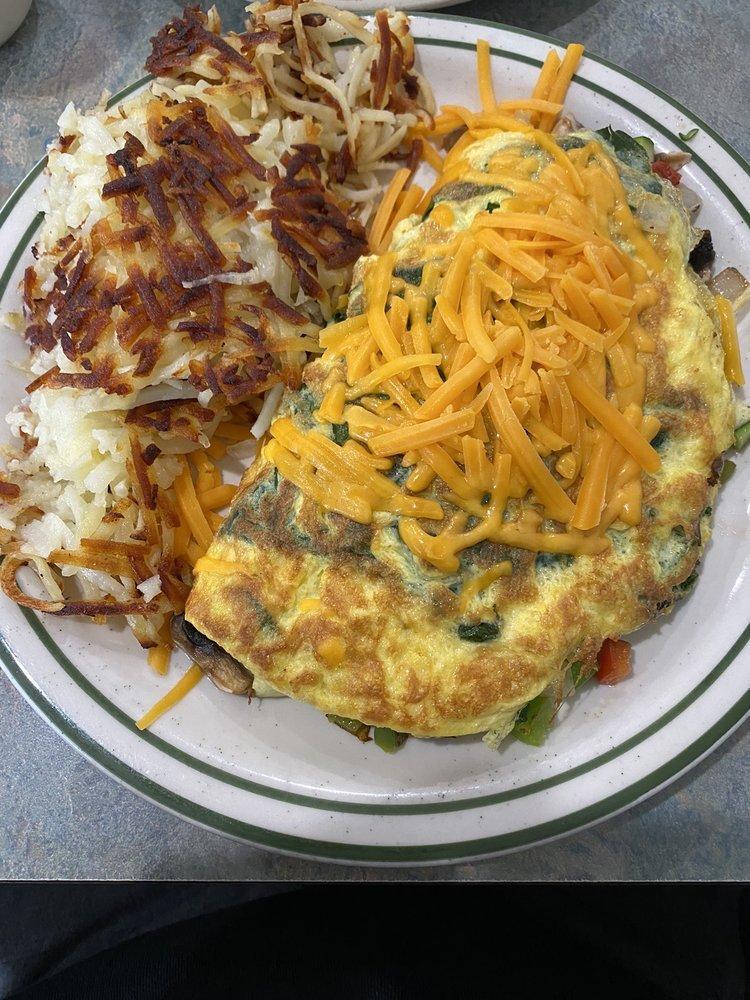Garden Omelette · Zucchini, spinach, mushrooms, bell peppers, onions, cheddar cheese.