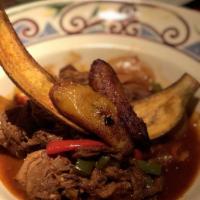 Ropa Vieja · Braised, shredded and stewed beef brisket,
tomatoes, bell peppers, onions, red wine,
white r...