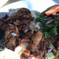 Chicken Shish Kebab · Marinated grilled chicken breast, salad, rice.