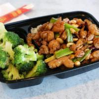 Kung Pao Chicken · Cubed dark chicken meat wok tossed with peanuts, Sechuan chili, red chili oil and topped wit...