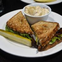 Left Coast BLT Sandwich · Thick-cut bacon, lettuce, tomato, fresh avocado, Brie and pesto mayo on whole wheat toast.