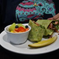 Spinach, Bacon and Blue Wrap · Grilled chicken breast, spinach, chopped bacon and tomatoes tossed in blue cheese dressing.