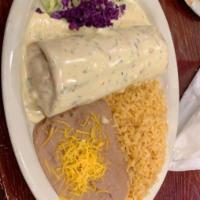 Special Chimi · Your choice of meat wrapped in a large flour tortilla, deep fried and topped with spinach ch...