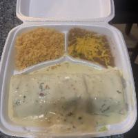 Spinach Enchiladas · 2 corn tortillas filled with spinach and cheese, topped with your choice of green sauce or s...