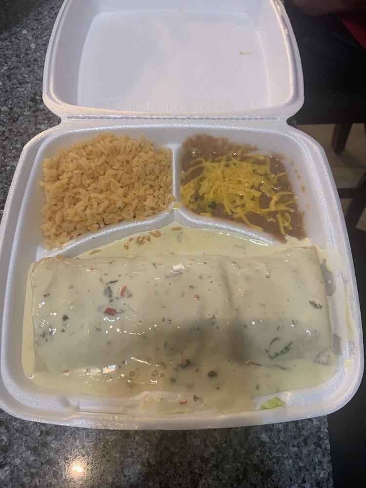 Spinach Enchiladas · 2 corn tortillas filled with spinach and cheese, topped with your choice of green sauce or spinach cheese sauce. Served with Southwestern corn and rice.