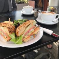 Salmon Bagel Sandwich · Your choice of bagel, smoked salmon, cucumber, onions,tomate, capers ,lettuce.with side of f...