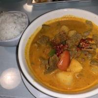 Yellow Curry · Gang lueng. Yellow curry paste, coconut milk, potatoes, tomatoes, bell peppers, and pineapple.