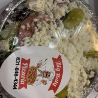 Greek Salad · Lettuce, black olives, onion, tomatoes, cucumbers and feta cheese