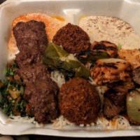 King Combo · Mediterranean combination plate of the vegetarian lovers and meat lovers. Includes a house s...