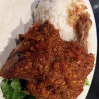 Ayam Goreng Balado · Fried chicken simmered in our special spicy sauce.
