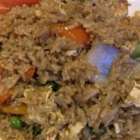 Basil Fried Rice · Basil fried rice with egg, chili, onion, carrot, basil and peas. Spicy.