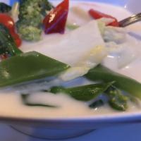 Tom Kha · Chicken or shrimp in coconut milk soup with lemongrass, galanga and lime juice.