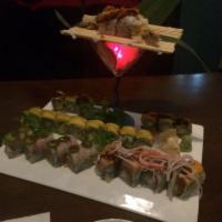 Samurai Roll · Shrimp tempura, spicy tuna inside, salmon crabmeat on top.