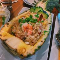 Khao Pad · Thai fried rice, egg, onions, scallions, tomatoes (Vegetarian)