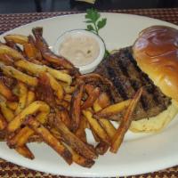 Tavern Special Cheeseburger · Select ground beef, sharp white cheddar cheese, balsamic roast onions, tomato, peppercorn ai...