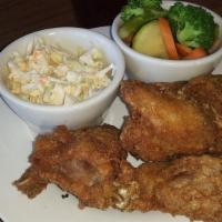 Fried Chicken · Our crispy fried chicken served with french fries and coleslaw.