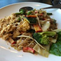 Pad Thai · Thin rice noodles cooked with bean curd, crushed peanut, bean sprout, scallion and egg.