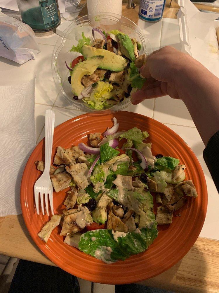 Grilled Chicken Avocado Salad · Grilled chicken, romaine lettuce, dried cranberries, avocado, cucumbers, onions, tomatoes and balsamic vinaigrette dressing.  Served with two of our 