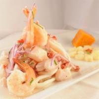 Ceviche Mixto Clasico · Classic fish and seafood ceviche in leche de tigre. Add sauce for an additional charge.