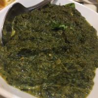 Saag Paneer · Fenugreek leaves and spinach cooked with fresh homemade cheese. Gluten free.