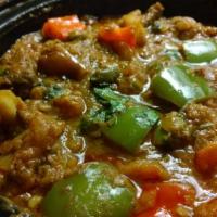 Lamb Patiala · A lamb stew with juicy pieces of lamb simmered in a light sauce with onions, tomatoes and mi...