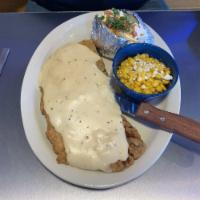 Country Fried Steak · Country fried steak smothered in cream gravy and served with choice of two sides