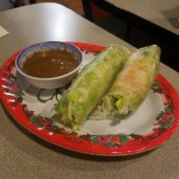 Spring Roll · Goi cuon. Rice vẻmicelli and  lettuce freshly rolled in rice paper. Served with peanut sauce.