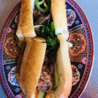 Vietnamese Sandwich · Vietnamese baguette with shredded carrot, cucumber and cilantro.