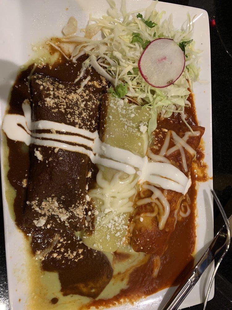 Enchiladas Verdes · Three enchiladas filled with shredded beef or shredded chicken, and smothered with red guajillo enchilada sauce. Topped with melted cheese and Mexican sour cream.
