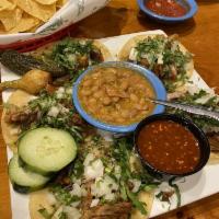 Street Tacos · Choice meat asada, chorizo, pastor,chicken or carnitas topped with cilantro and onions serve...