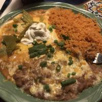 Huevos Rancheros · Corn tortilla topped with 2 sunny side up eggs and topped with ranchera sauce, cheese and so...