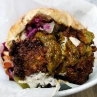 Falafel Sandwich · Our signature sandwich with choice of toppings or 