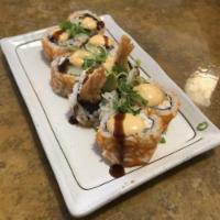 Mex Shrimp Roll · Shrimp tempura, crab and avocado in a roll with spicy sauces on top.