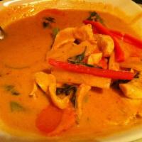 Red Curry · Bamboo shoots, carrots, green beans and basil in red curry paste with coconut milk. Spicy.