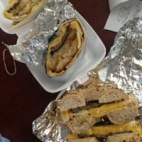 Breakfast Wrap · Choice of breakfast meat with choice of cheese and scrambled eggs on a wrap. Served with has...