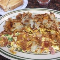 Western Omelette · Onions, peppers, tomatoes, and pork roll.