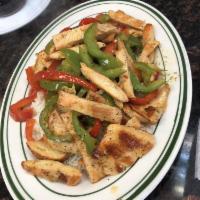 Chicken Fajitas · Red and green peppers, onions over rice with 3 tortillas.