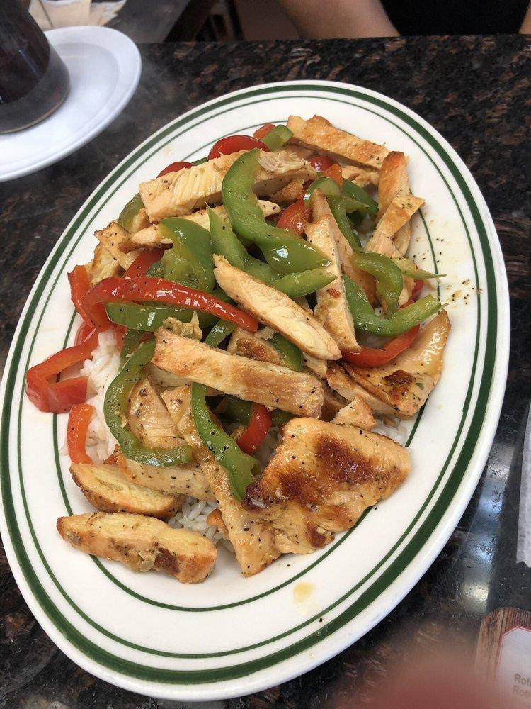 Chicken Fajitas · Red and green peppers, onions over rice with 3 tortillas.