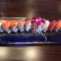 Rainbow Roll · Tuna, salmon, albacore, shrimp, white fish, crab, avocado and cucumber.