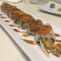 Hot Night Roll · Raw. Shrimp tempura, cucumber topped with spicy tuna, masago, green onion and eel sauce.
