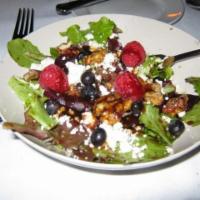 Cardone's Salad · Field greens tossed with raspberries, blueberries, candied walnuts and Gorgonzola cheese. Se...