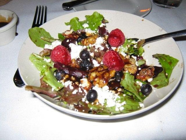 Cardone's Salad · Field greens tossed with raspberries, blueberries, candied walnuts and Gorgonzola cheese. Served with balsamic vinaigrette.