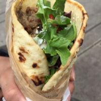 Beef and Lamb Gyro · Served in a toasted handmade pita with house made tzatziki sauce, onion, mixed greens, tomat...
