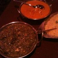 Saag Paneer · Spinach cooked with homemade cheese, in cream and spices. 