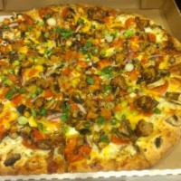 Garlic Gourmet Pizza · Creamy white garlic sauce, mozzarella cheese, pepperoni, mushrooms, red onions, sausage, tom...