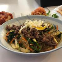 Japchae · Pan-broiled clear noodle with beef, vegetables, & egg.
