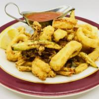 Fritto Misto · Liguria. Assortment of fried shrimp, calamari and zucchini.