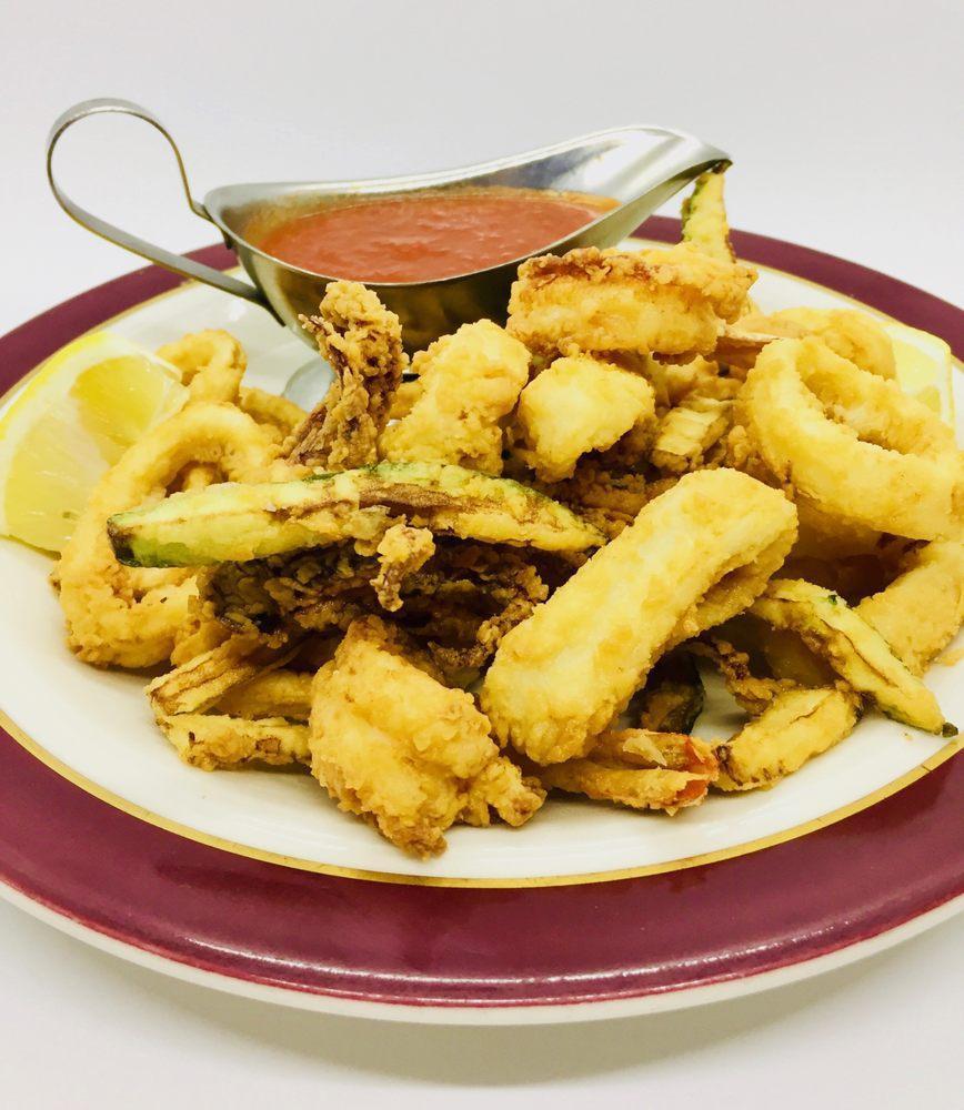 Fritto Misto · Liguria. Assortment of fried shrimp, calamari and zucchini.