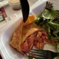 Smoked Salmon Crepe · Dill cream cheese, smoked salmon, fresh baby spinach, sliced tomatoes and a vinaigrette dres...
