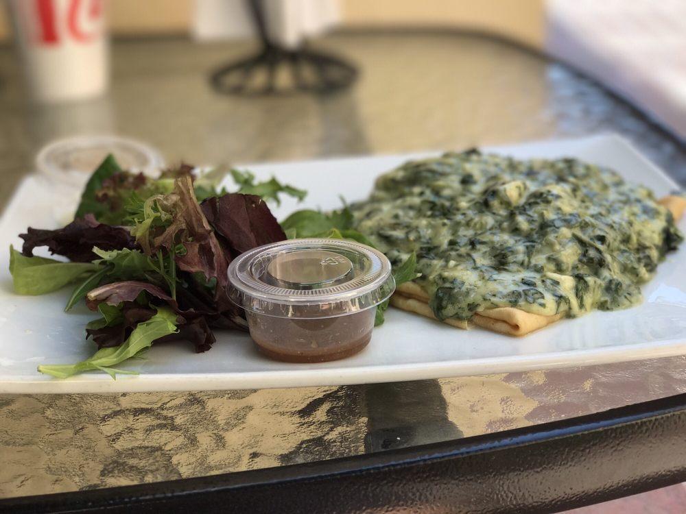Chicken Florentine Crepe · Diced chicken breast and florentine sauce topped off with a drizzle.
